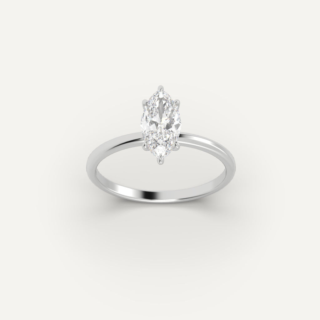 White Gold 1 Carat Engagement Ring On Woman's Hand