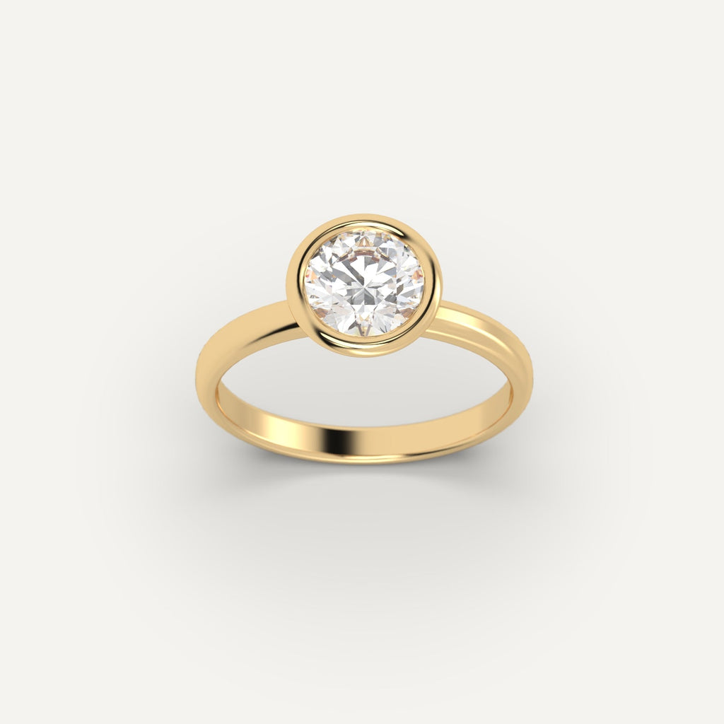 Yellow Gold 1 Carat Engagement Ring On Woman's Hand